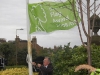 Hoisting the 2008 green flag